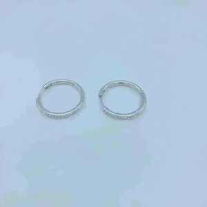 Silver and Diamond look earrings.